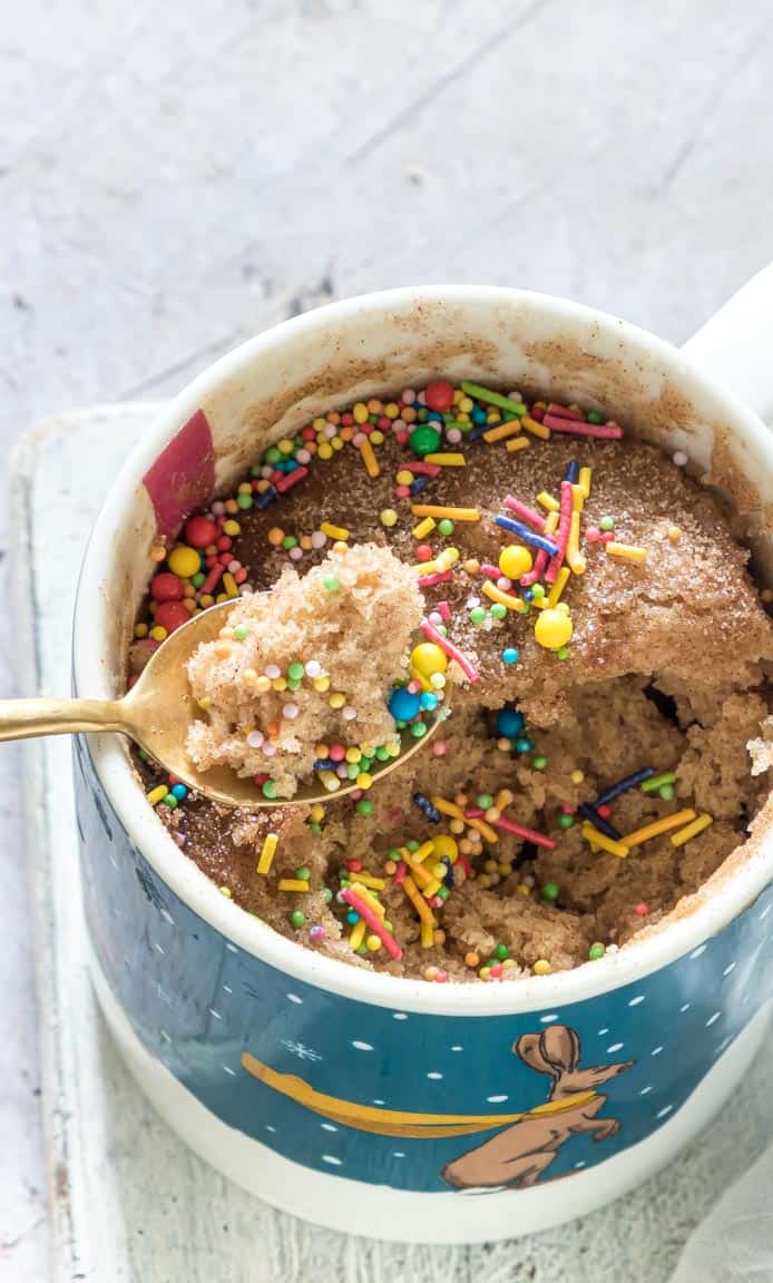snickerdoodle mug cake topped with sprinkles