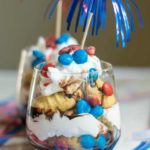 red white and blue trifle served in glass jars