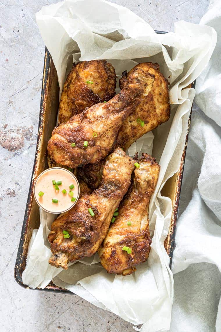 air fryer chicken drumsticks packed in a meal prep box