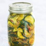 pickled zucchini in a glass mason jar