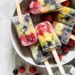 6 rainbow popsicle servings in a bowl