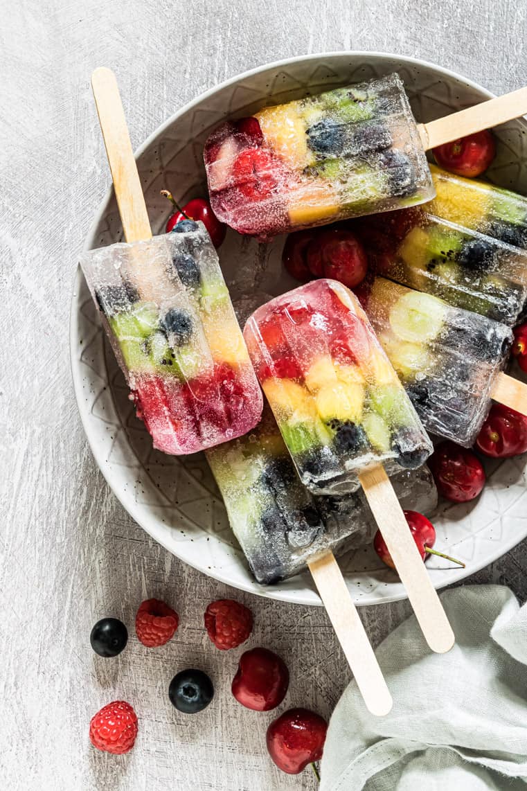 6 rainbow popsicle servings in a bowl