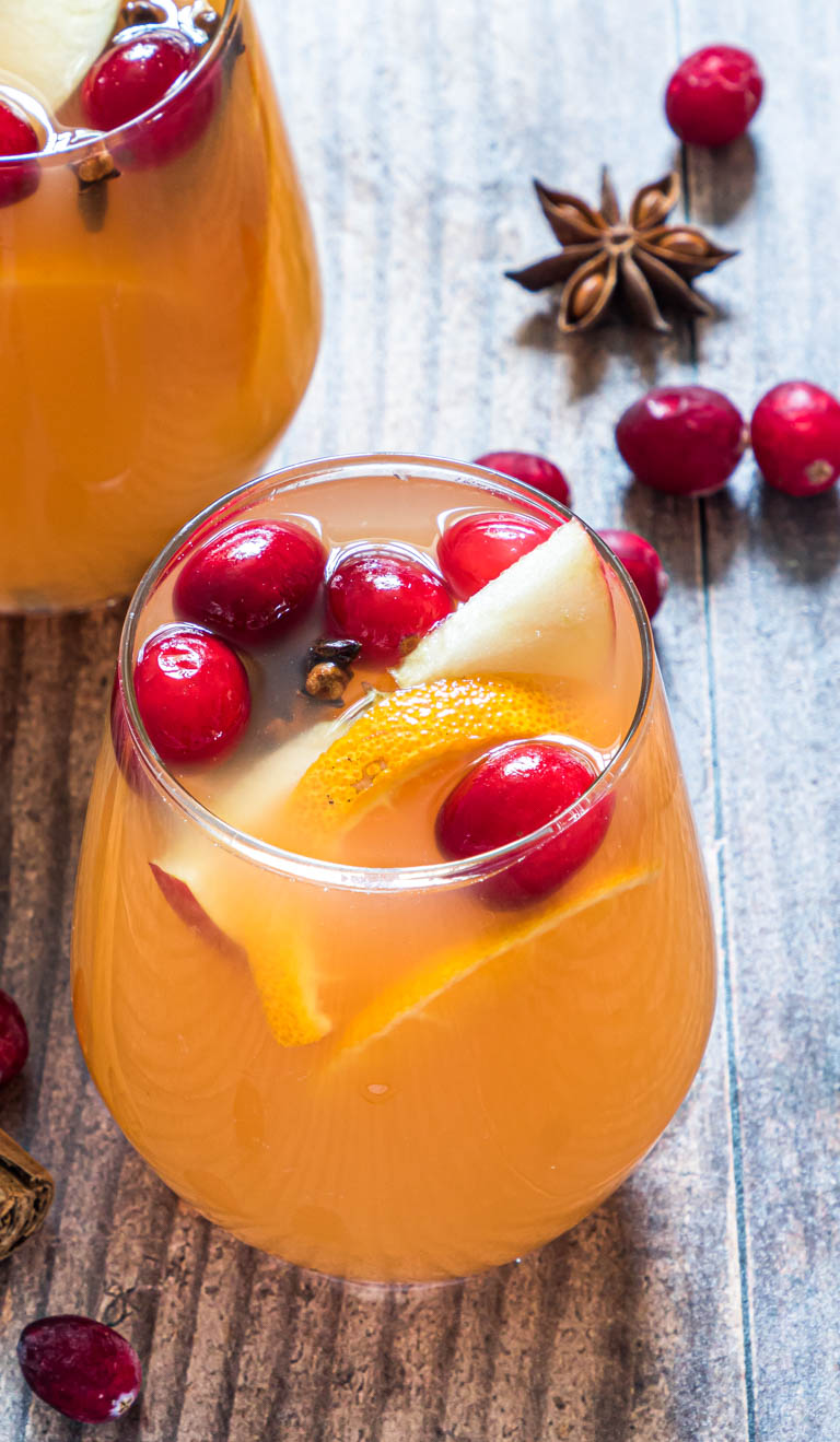 two glasses filled with instant pot apple cider