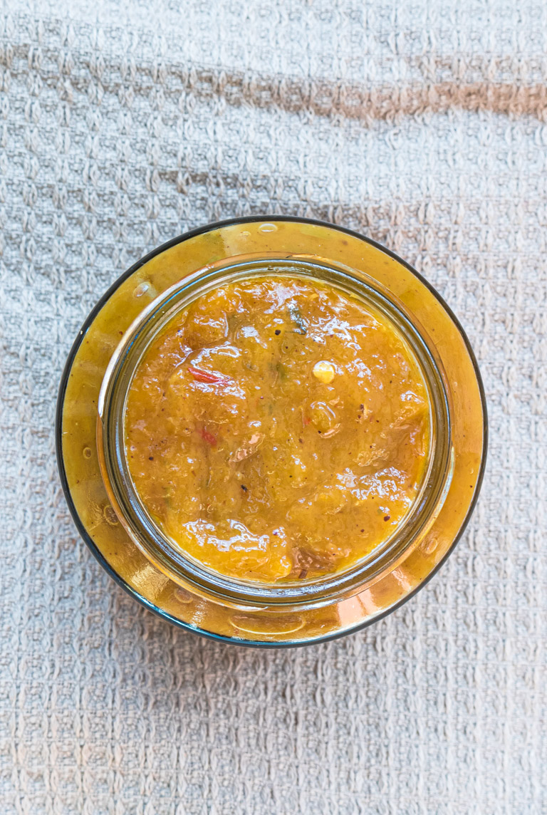 top down view of the mango chutney in a glass jar