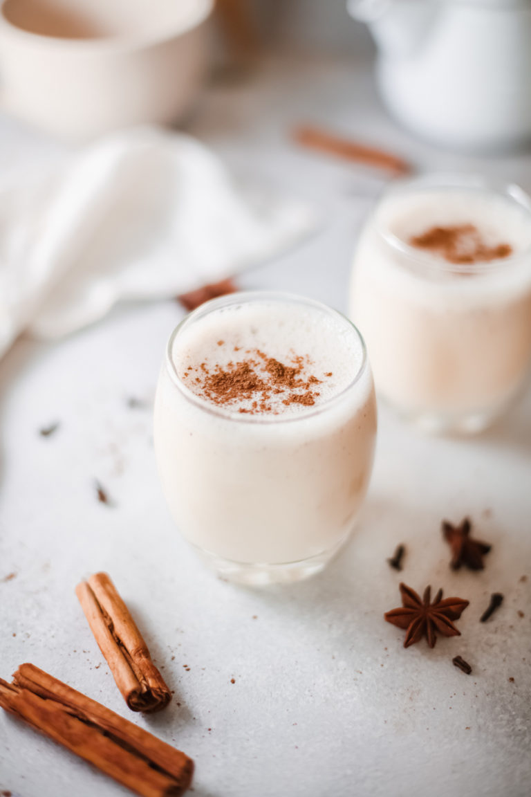 two glasses filled with Instant Pot Eggnog