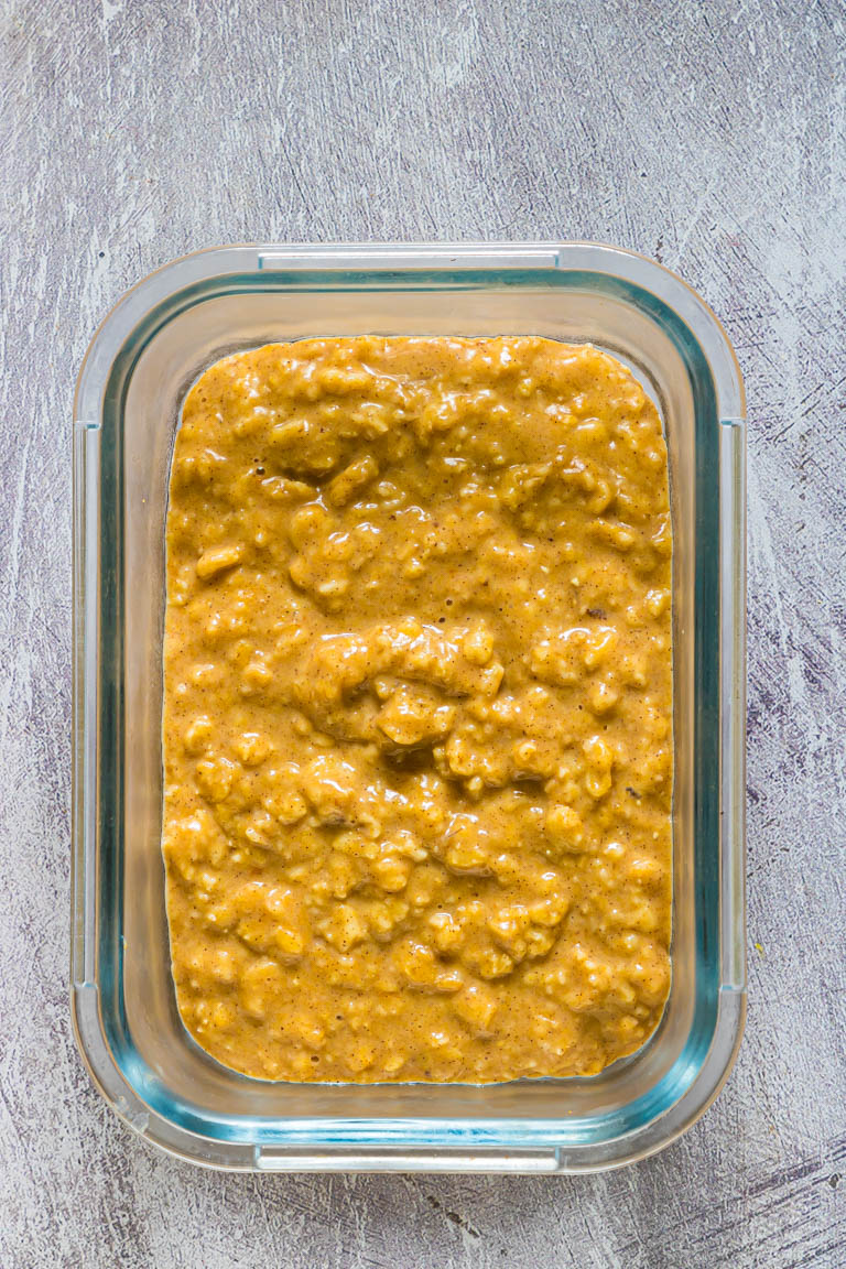 instant pot pumpkin oatmeal in a glass meal prep container