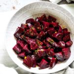 pressure cooker beets salad served in a white ceramic bowl