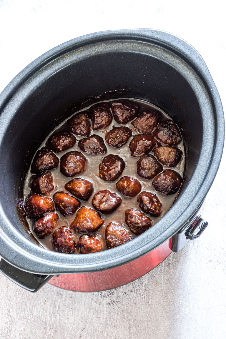 completed slow cooker meatballs inside a crockpot and ready to serve