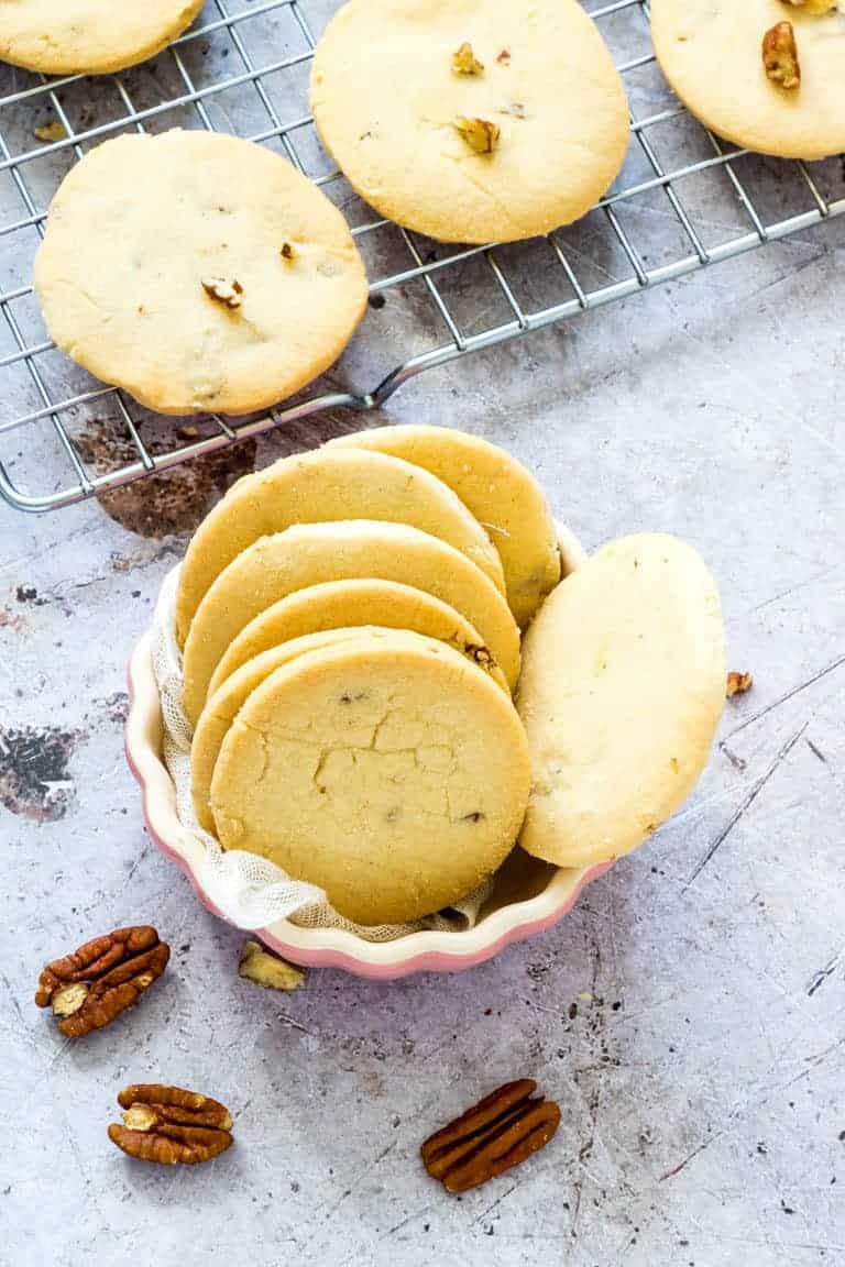 Pecan Shortbread Cookies served in a scalloped bowl
