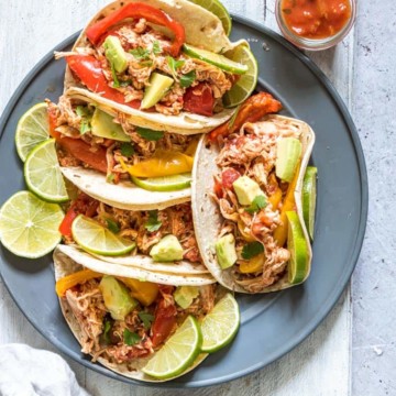 a plate filled with instant pot chicken fajitas