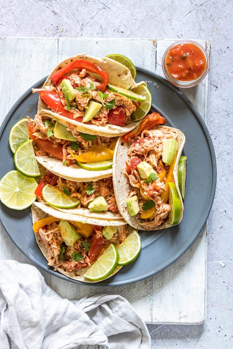 a plate filled with instant pot chicken fajitas