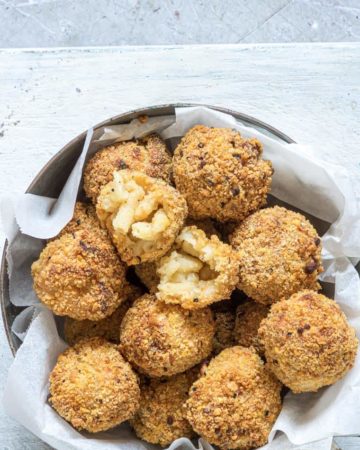 a batch of air fried mac and cheese balls ready to be served