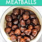 Grape jelly meatballs in a serving dish.