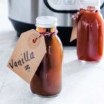 The completed Instant Pot Vanilla Extract packed in individual bottled and tied with handwritten gift tags