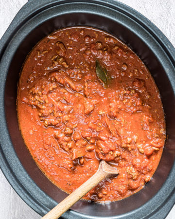 top down view of crockpot spaghetti sauce inside the slow cooker