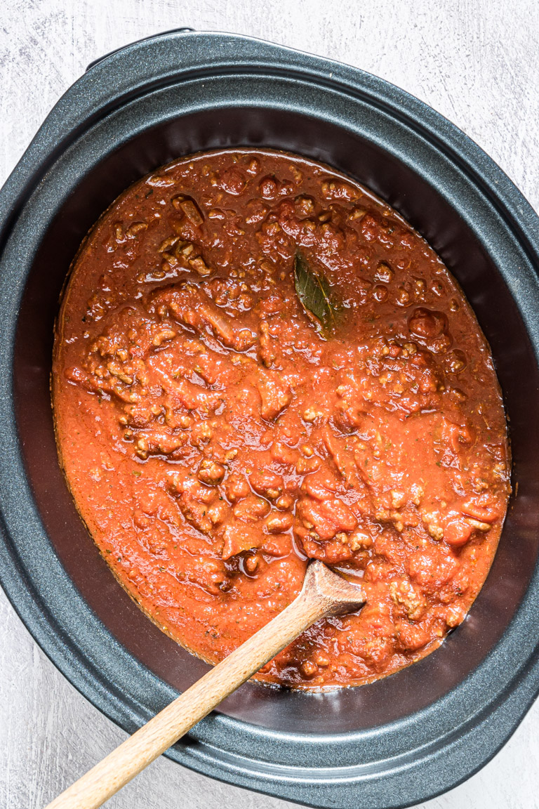 top down view of crockpot spaghetti sauce inside the slow cooker.