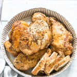 the completed instant pot frozen chicken breast recipe served in a ceramic dish