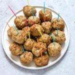 Air Fryer Meatballs (Turkey Meatballs) on a plate with coloured toothpics