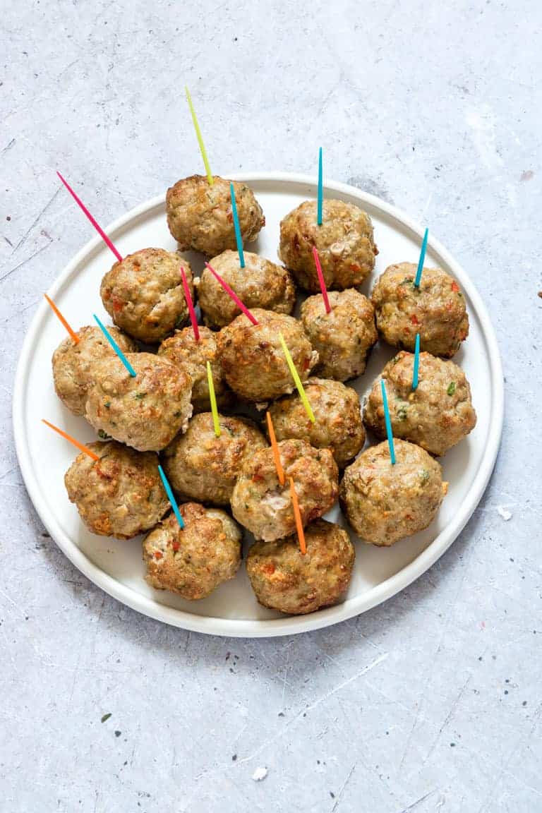 Air Fryer Meatballs (Turkey Meatballs) on a plate with coloured toothpics