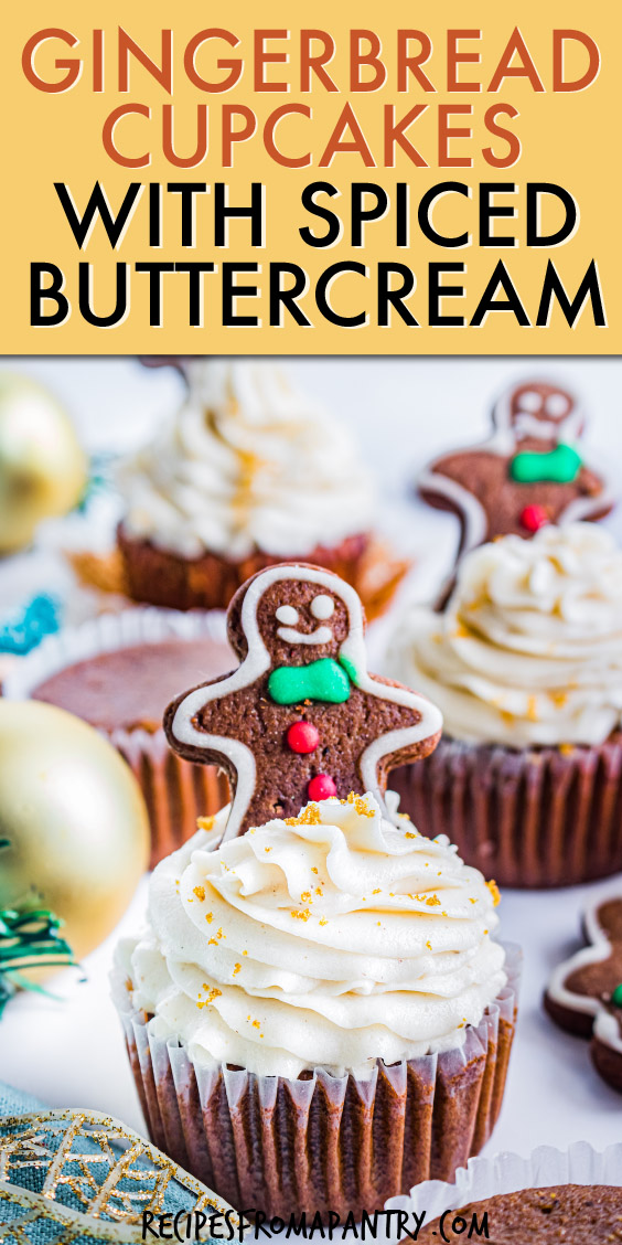 a gingerbread cupcake topped with a gingerbread man