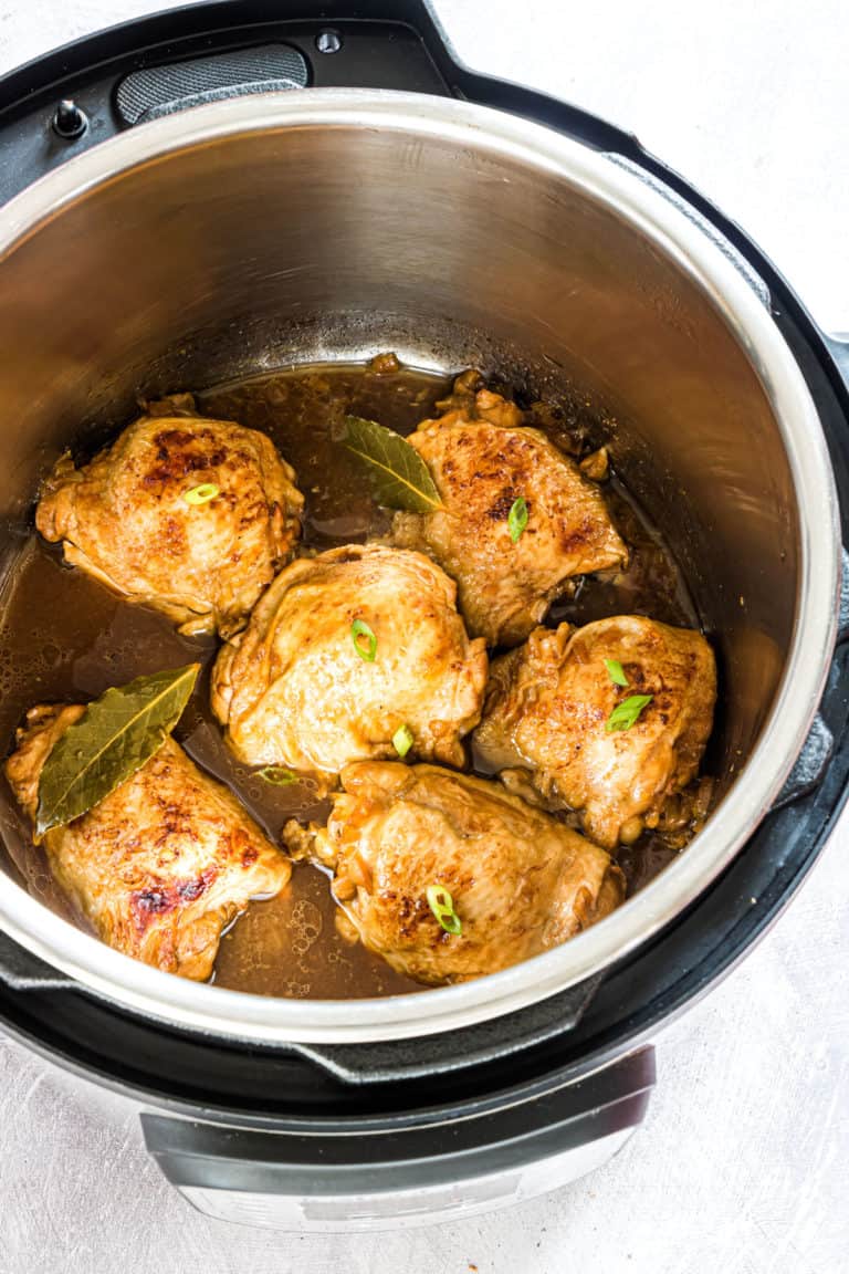 the finished adobo chicken inside the Instant Pot