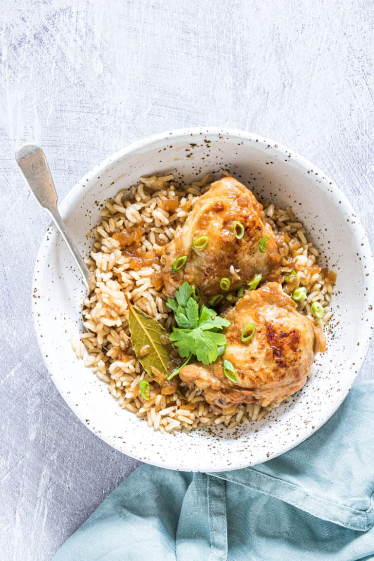 instant pot adobo chicken served in a ceramic dish