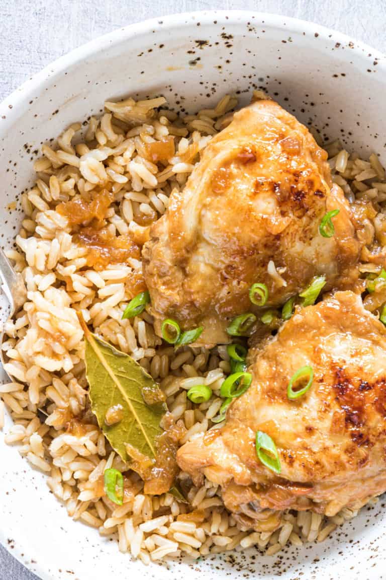 close up of instant pot adobo chicken served over rice