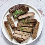 sliced air fryer steak on a plate