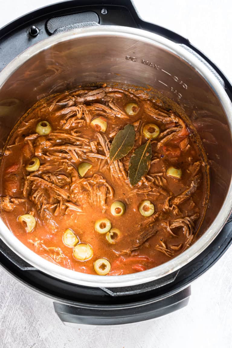 the finished pressure cooker ropa vieja inside the instant pot insert