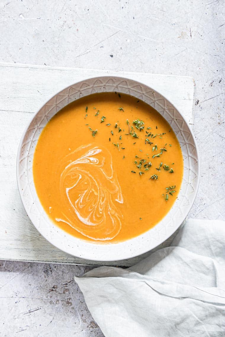 top down view of a bowl of jamaican pumpkin soup