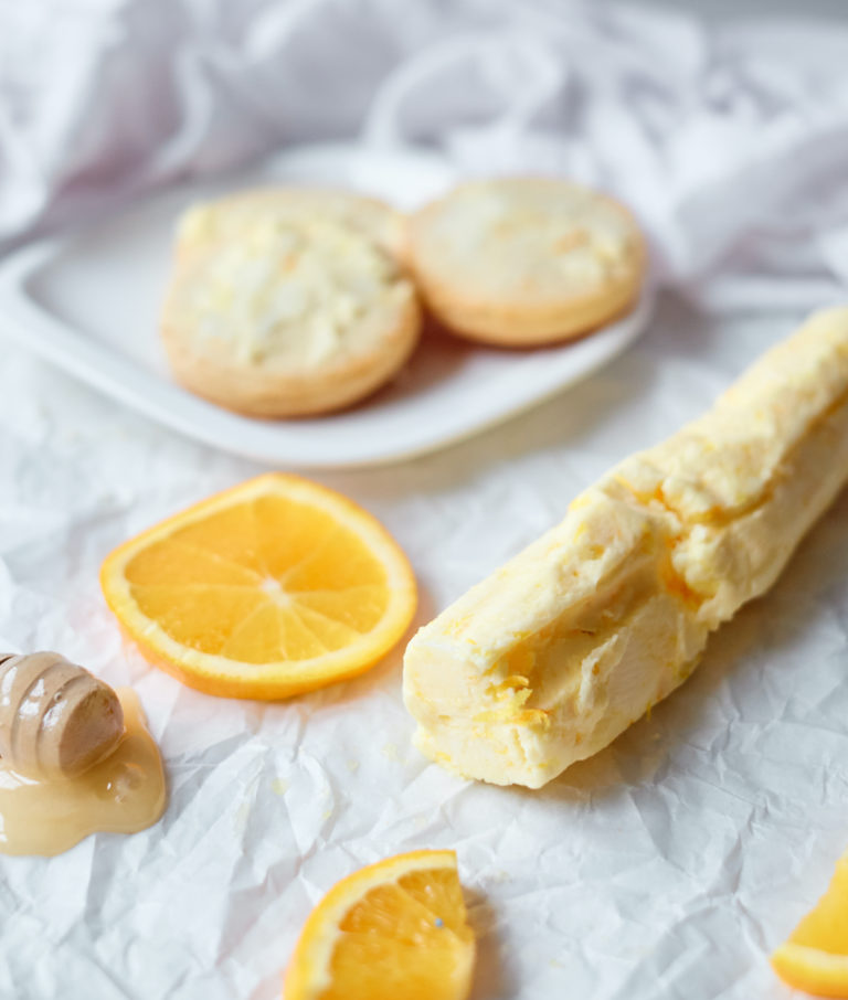 honey butter spread onto biscuits