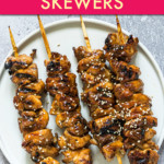 CHICKEN SKEWERS ON A PLATE