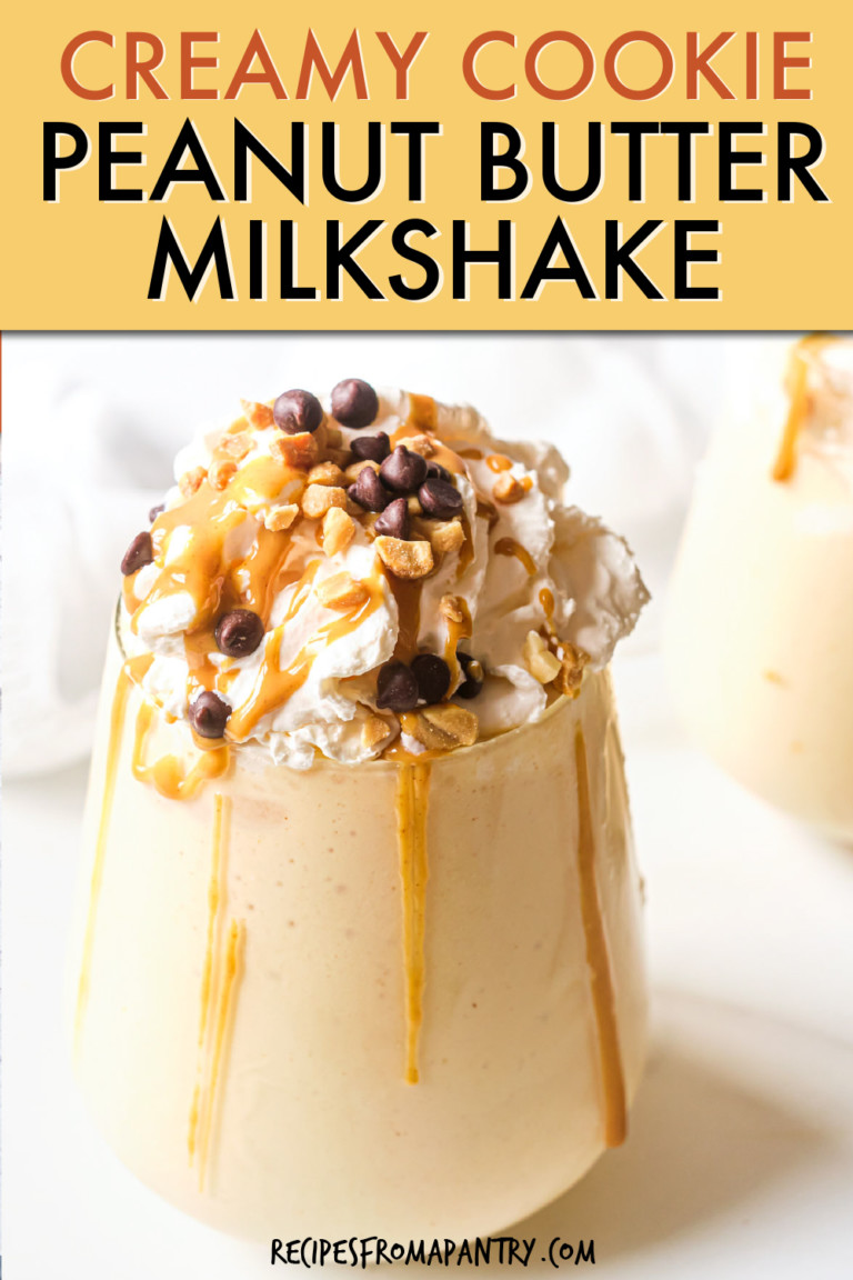 PEANUT BUTTER MILKSHAKE TOPPED WITH WHIPPED CREAM IN A GLASS
