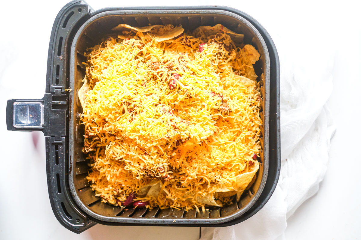 Air Fried Nachos ingredients in an air fryer basket