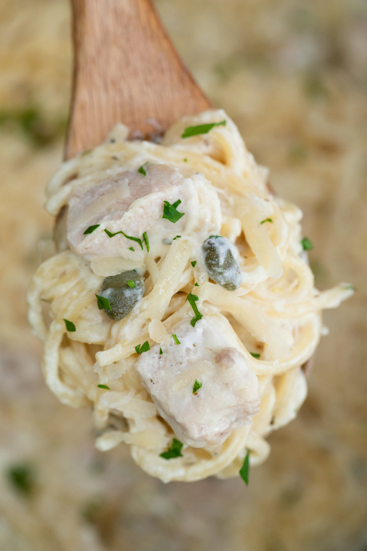 a forkful of the instant pot chicken alfredo