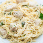 a serving of instant pot chicken alfredo in a white plate