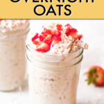 a jar of overnight oats garnished with strawberries.