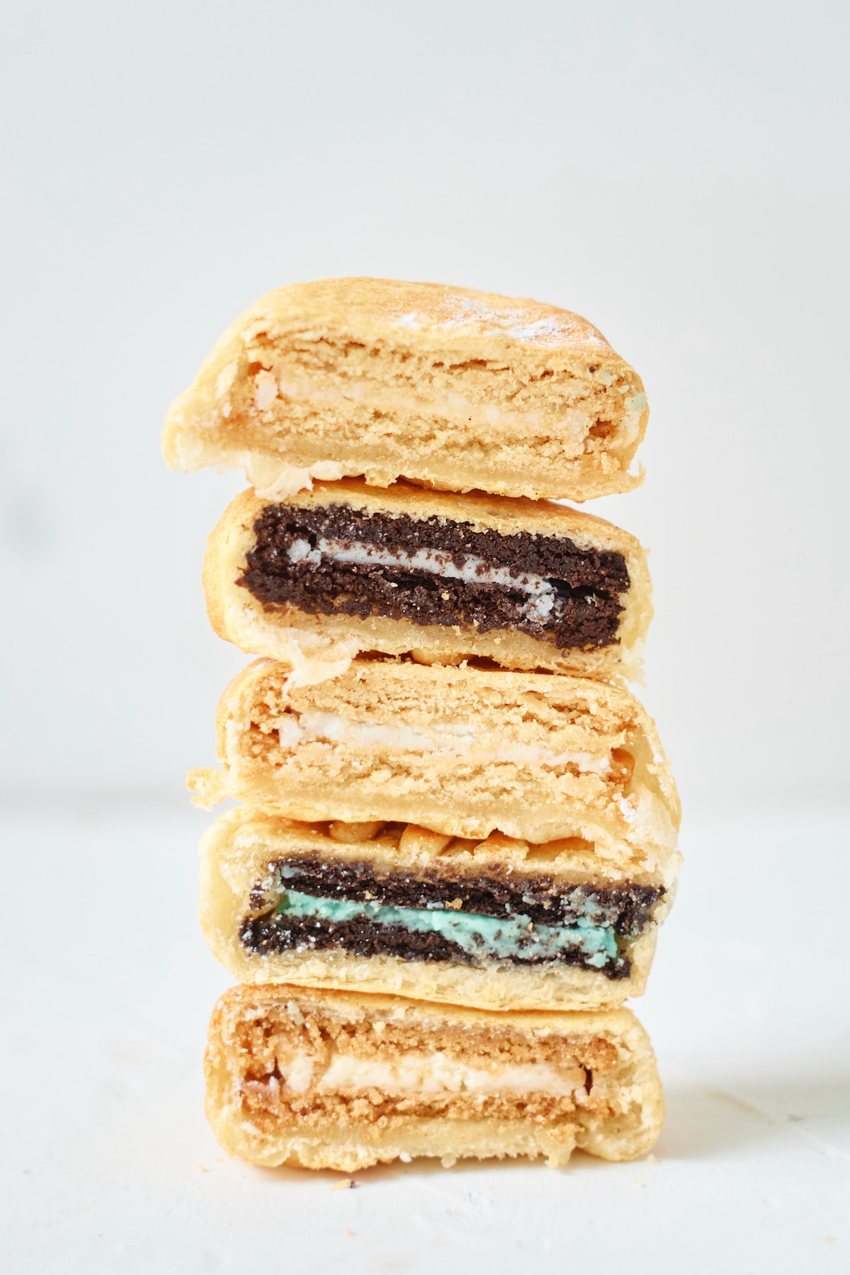air fried oreos cut in half and stacked vertically