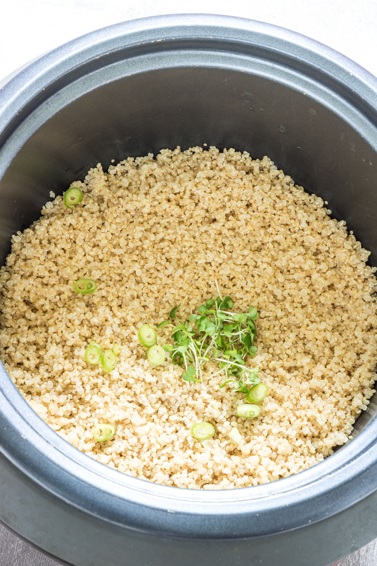 top down view of the finished quinoa in rice cooker