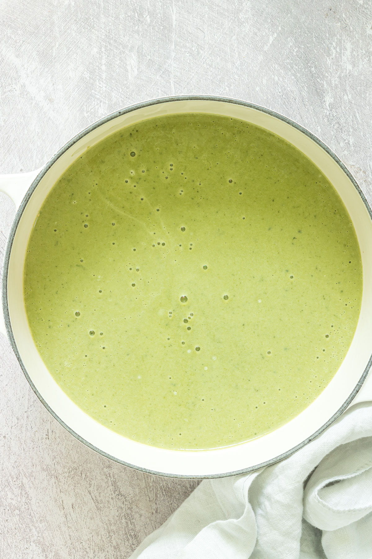 close up view of a bowl filled with ginger spinach soup