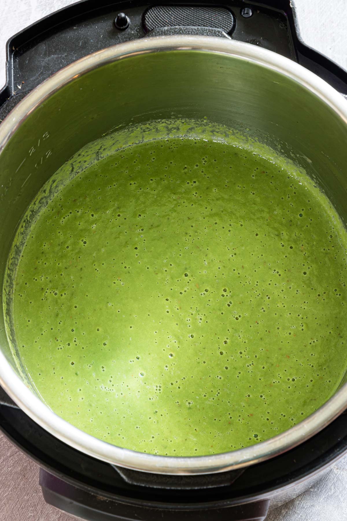 top down view of the finished instant pot pea soup inside the instant pot