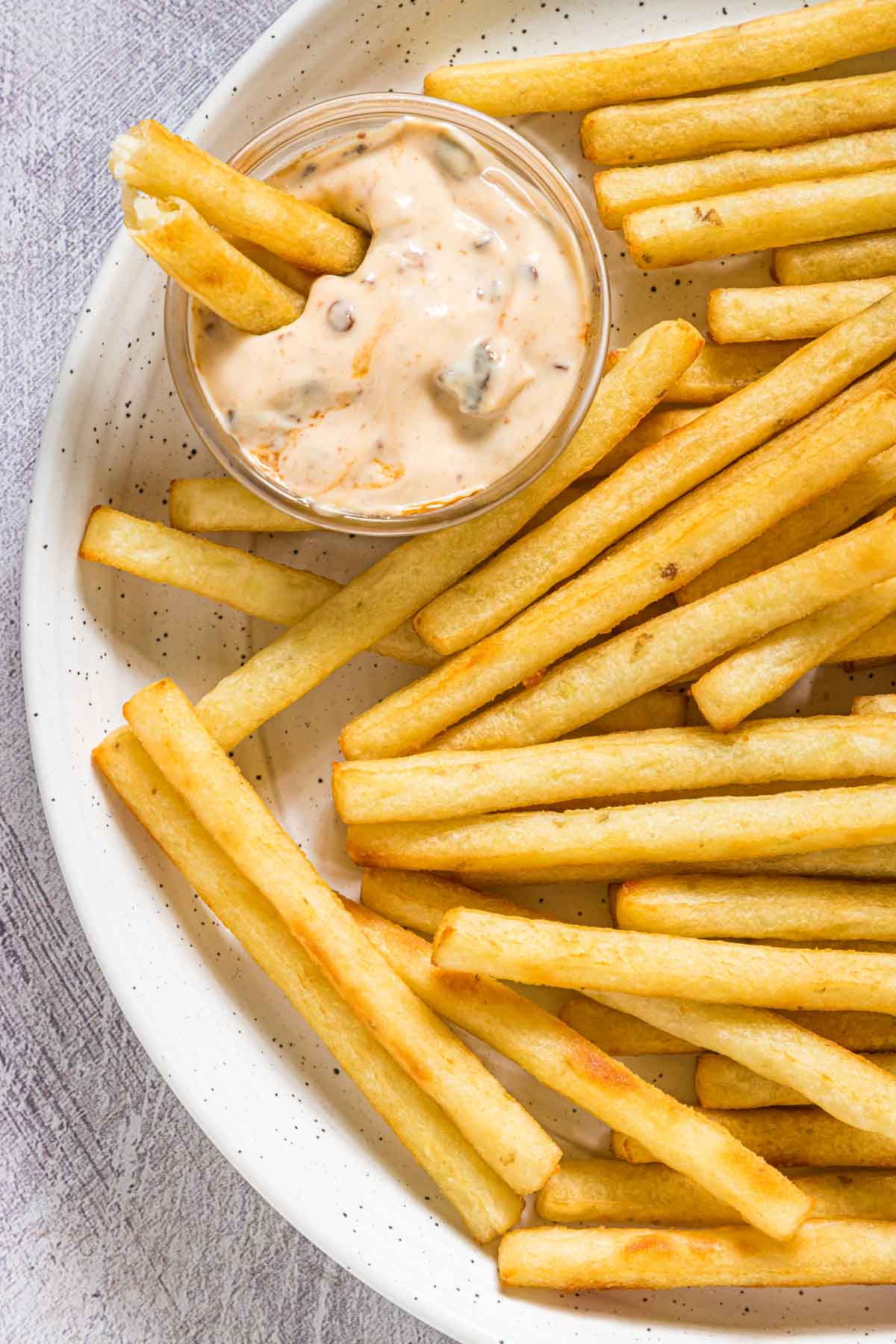 close up view of chipotle aioli served with french fries