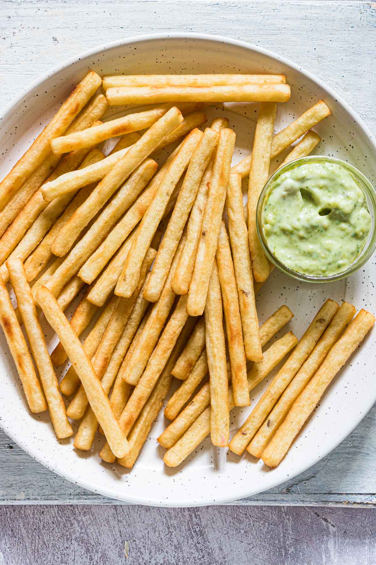 french fries served with the basil pesto aioli dipping sauce