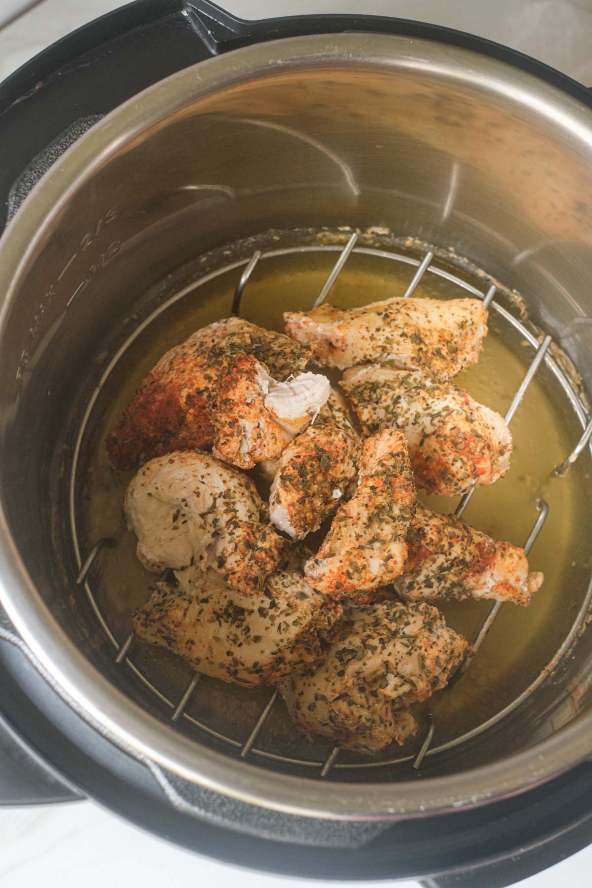 top down view of the completed chicken tenders in instant pot