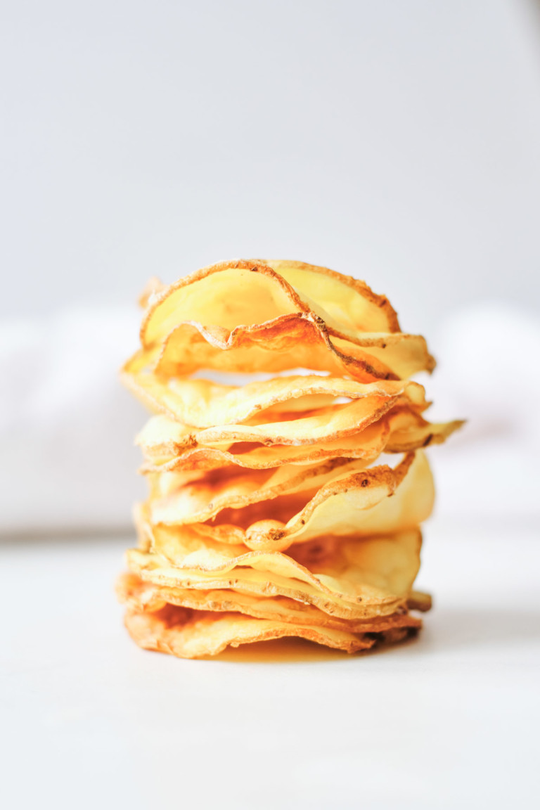 air fryer potato chips stacked vertically