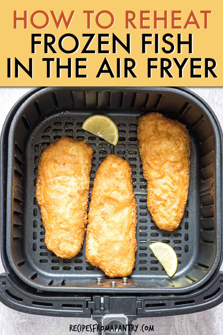 THREE BATTERED FISH FILLETS IN AN AIR FRYER BASKET