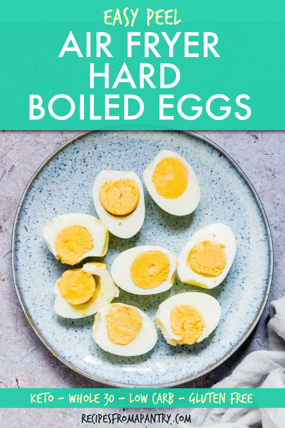 several halved boiled eggs on a plate