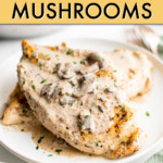 two chicken breasts with mushroom sauce on a plate