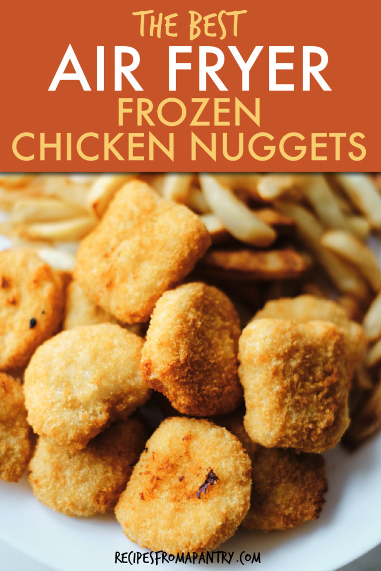 CHICKEN NUGGETS ON A PLATE WITH FRENCH FRIES