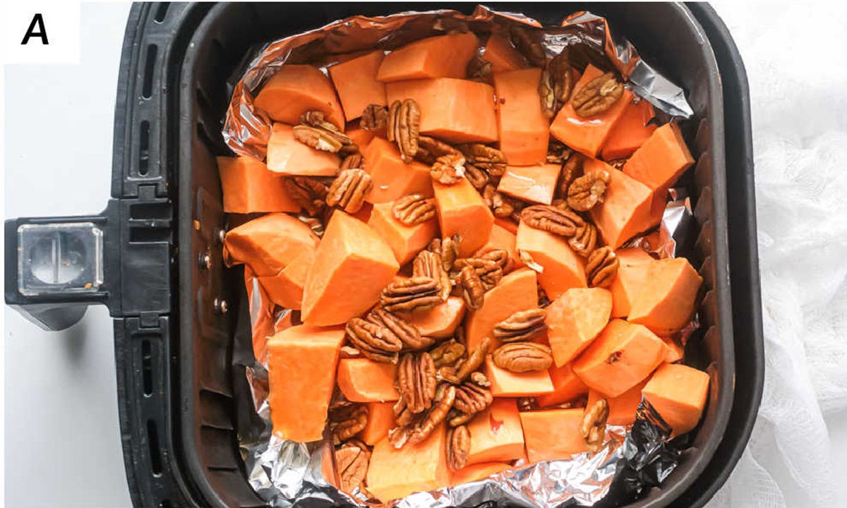 image collage showing the steps for making air fryer sweet potato cubes